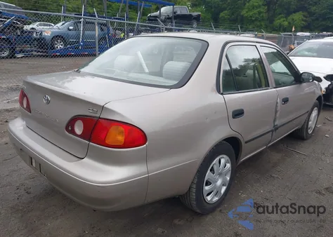 2001 Toyota Corolla Ce z USA, uszkodzony, nr VIN 2T1BR12EX1C416688